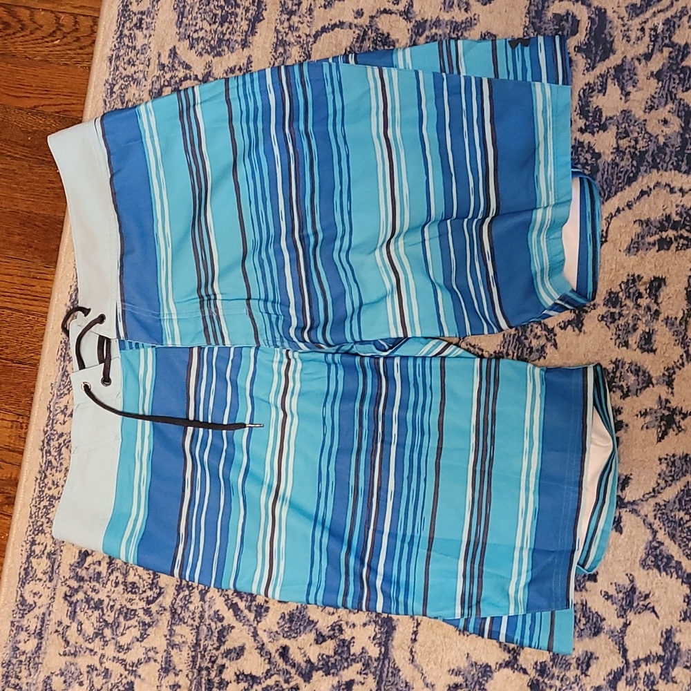 Under Armour sz 36 swim trunks board shorts blue SW41